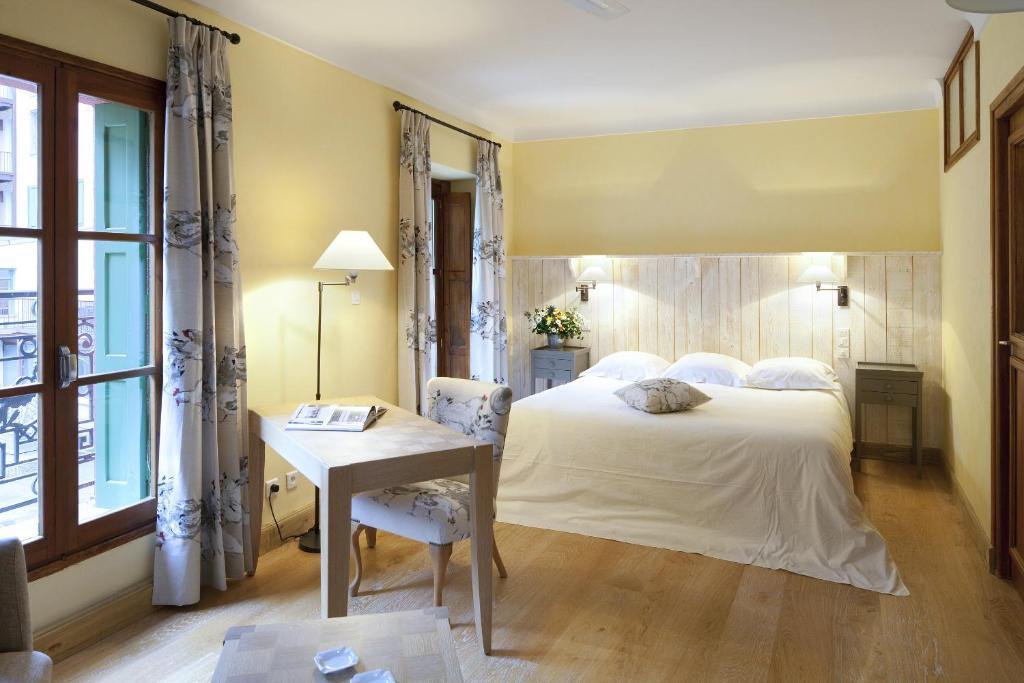 Le Grand Hotel Moltig les Bains Szoba fotó